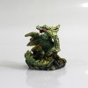 DRAGÃO COM CASTELO DECORATIVO EM RESINA REF: PW170027
